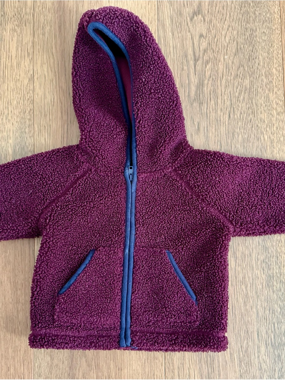 Janie and Jack Burgundy Sherpa Jacket with Navy Trim. Size is 6-12 months.